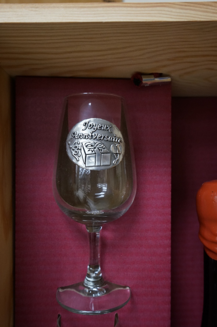 One bottle of Kummel, another, Tokaji, and a Joyeux Anniversaire, cased